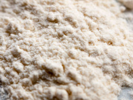 close up of white flour powder for cooking food macro; essex; england; uk