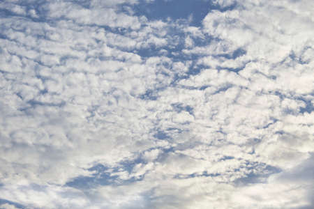 background of white clouds in clear blue sky