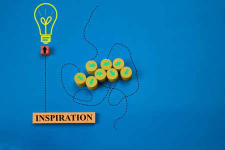 wooden blocks with drawn shapes showing the concept of business inspirationの写真素材