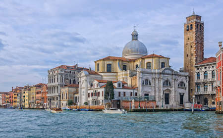 Beautiful view on the Grand Canal of the Palazzo Labia and Church of San Geremia during morning in Venice, Italyの写真素材
