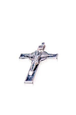 Crucifix isolated on white background with space for textの写真素材