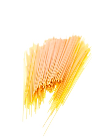 Dry Italian pasta on white backgroundの写真素材