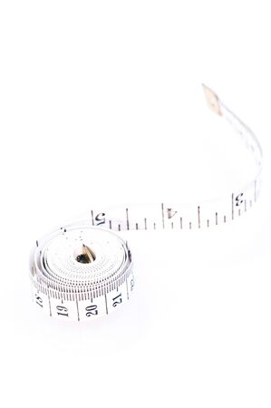 Black and white tape measure on white backgroundの写真素材