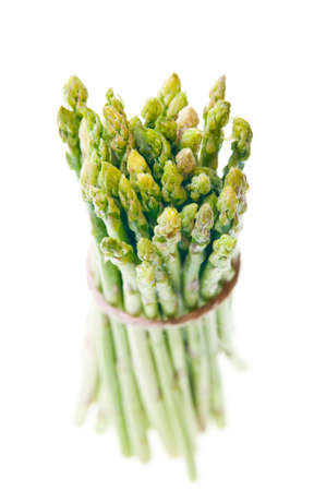 Fresh asparagus tide in a bunch with a thin ropeの写真素材