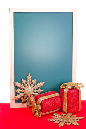 Christmas message board vertical over red and white backgroundの写真素材