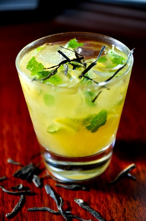 Green tea mojito close up on a wooden tableの写真素材