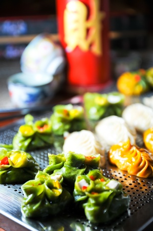 Assorted dim sum close upon stainless steel steamerの写真素材