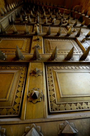 Spiky brass door at a fort in Indiaの写真素材