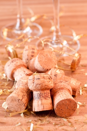 Champagne corks and gold glitter decorationの写真素材