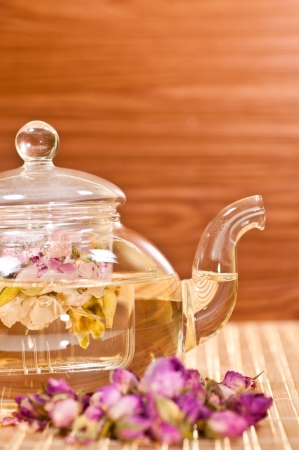 Pink rose tea on bamboo mat backgroundの写真素材