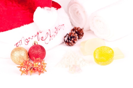 Christmas holiday spa concept with soaps, bath salts and towelの写真素材