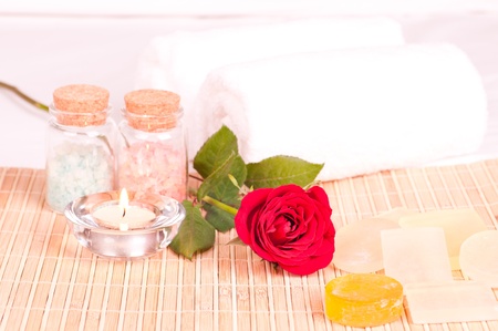 In room romantic spa concept with rose and bath saltの写真素材