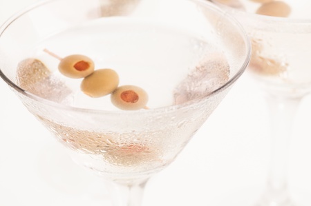 Dry Martini Cocktail top view close up, made from Gin and a dash of Vermouth garnished with stuffed olivesの写真素材