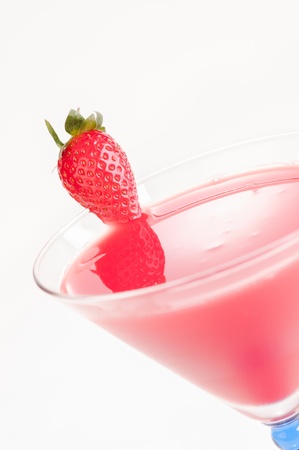Strawberry Daiquiri closeup, made from rum, lemon juice, fresh strawberry juice and garnished with a strawberryの写真素材