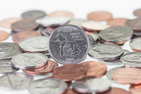 Michigan State Quarter with coins extreme close upの写真素材