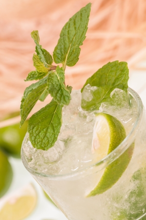 Mojito cocktail top view close up with a straw hat background の写真素材