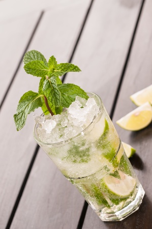 Mojito cocktail on wooden table close up の写真素材
