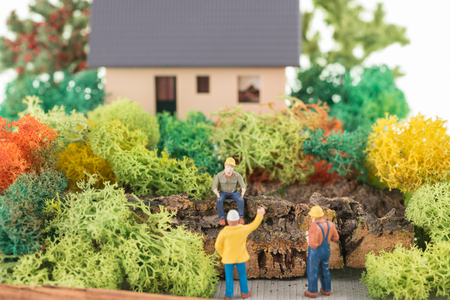 Miniature workers getting ready to renovate the houseの写真素材