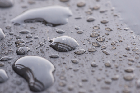 Raindrops natural pattern on wooden deckの写真素材