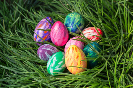 Easter eggs on the green grass close upの写真素材