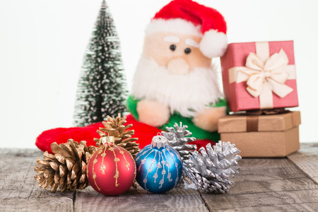 Christmas baubles and Santa Claus toy backgroundの写真素材