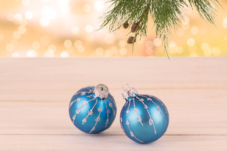 Christmas baubles and pine tree branchの写真素材