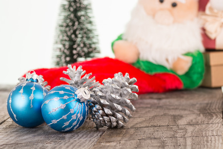 Christmas baubles and silver pine conesの写真素材