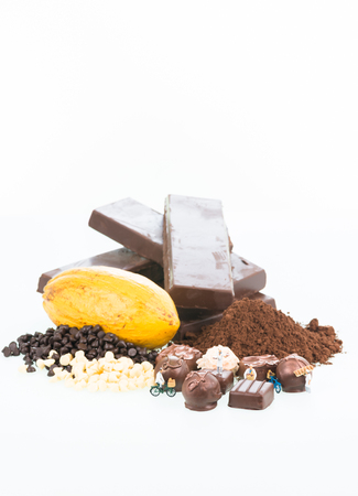 Miniature pastry chefs and cocoa over white backgroundの写真素材