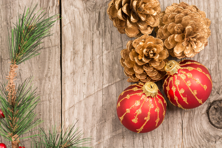 Christmas baubles and pine conesの写真素材