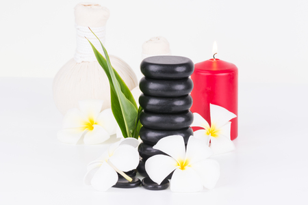 Herbal spa with basalt stones and herbal compress ballsの写真素材