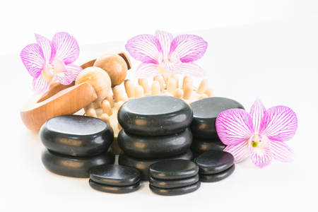 Spa with basalt stones, massage roller and cellulite massager close upの写真素材