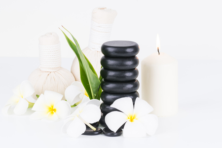 Traditional herbal spa with hot stones and herbal compress ballsの写真素材