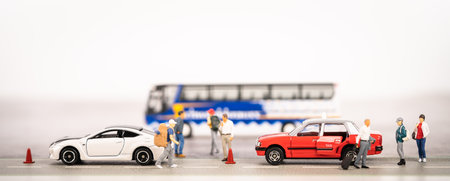 Land travel concept with miniature trravelersの写真素材