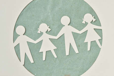 Paper silhouette cut of children chain - Ecology and social responsibility conceptの写真素材