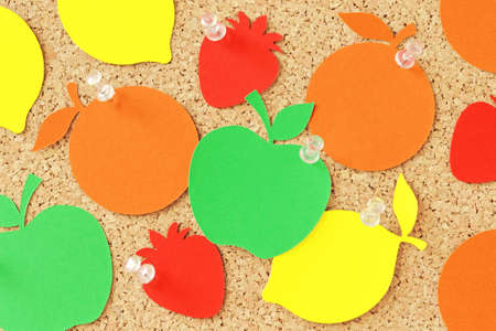 Fruit shaped paper note on pinboardの写真素材
