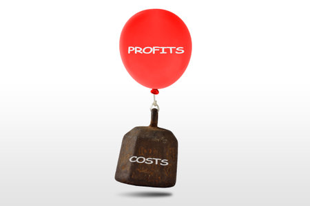 Heavy iron weight with the written Costs and red balloon with the written Profits floating on white background - Concept of finance and economyの写真素材