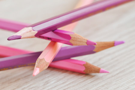 Pink stacked pencils - Concept of women and teamworkの写真素材
