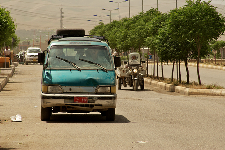 Small busses are the most popular and surprisingly fast means of transportation in Middle East  Iraqi Kurdistan, Iraqのeditorial素材