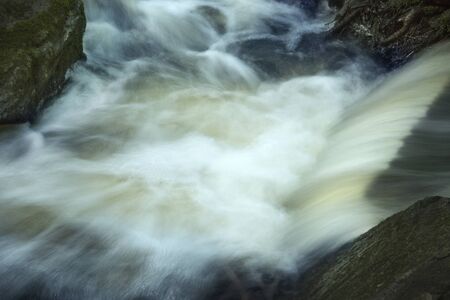 Cascade, plunging over a ledge into pool at Southford Falls, Oxford, Connecticut.