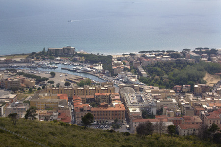 Terracina, Lazio, Italy from Mount Saint Angelo. Two boats on the Mediterranean Sea are approaching the marina.の写真素材