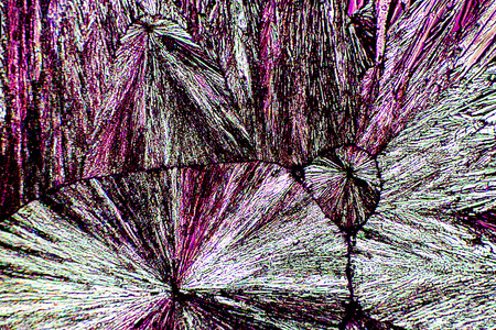Abstract micrograph of ascorbic acid crystals in a bewildering array of shapes and colors.の写真素材