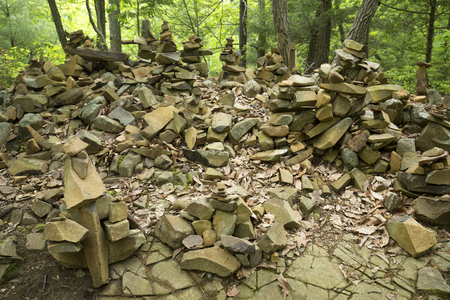 Basalt outcrop with rock totems along the Metacomet Trail in Penwood State Park, Bloomfield, Connecticut.の写真素材