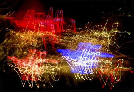 Abstract light trails, with major distortion and blurring of lights in downtown Pittsburgh, Pennsylvania, at night.の写真素材