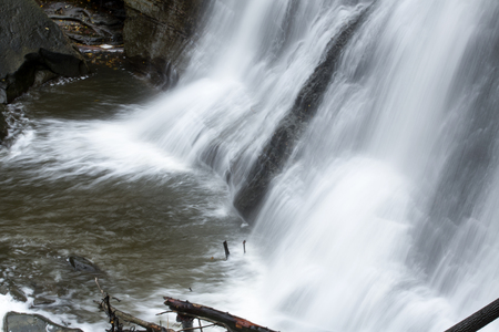 Base of the misty cascade of Brandywine Falls in Cuyahoga Valley National Park in northern Ohio.の写真素材
