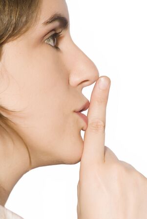young girl portrait with finger in the mouthの写真素材