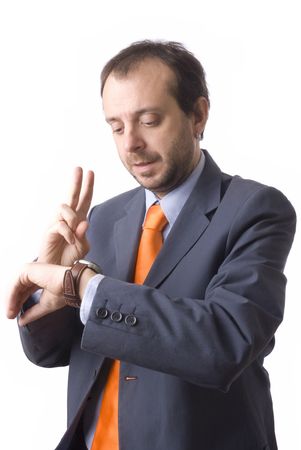 young businessman looking to the watch and countingの写真素材