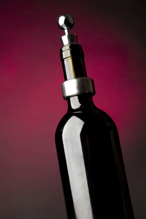 Bottle and wine glass in white back groundの写真素材