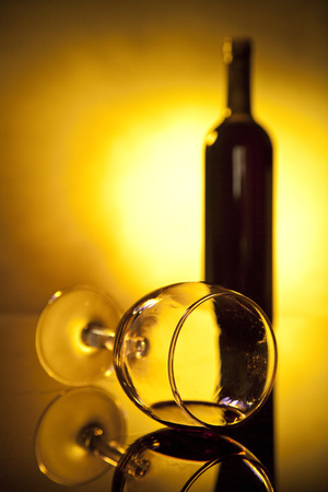 Bottle and wine glass in white back groundの写真素材