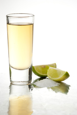 a tequila served with lemonの写真素材