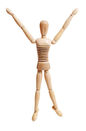 Wooden mannequin jumping isolated on white backgroundの写真素材